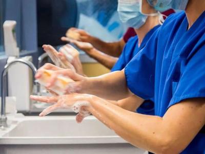 Laboratory staff washing their hands